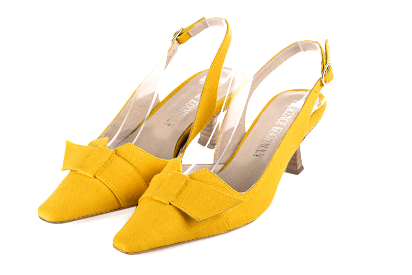 French elegance and refinement for these yellow dress slingback shoes, with a knot, 
                available in many subtle leather and colour combinations. The pretty French spirit of this beautiful pump will accompany your steps nicely and comfortably.
To be personalized or not, with your materials and colors.  
                Matching clutches for parties, ceremonies and weddings.   
                You can customize these shoes to perfectly match your tastes or needs, and have a unique model.  
                Choice of leathers, colours, knots and heels. 
                Wide range of materials and shades carefully chosen.  
                Rich collection of flat, low, mid and high heels.  
                Small and large shoe sizes - Florence KOOIJMAN